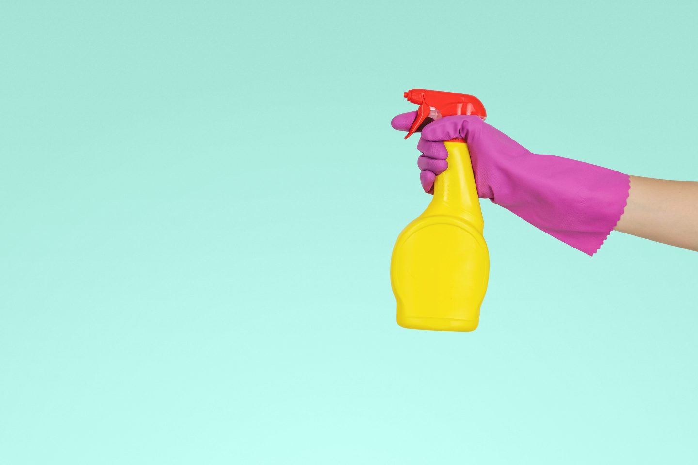Yellow cleaning product in a spray bottle